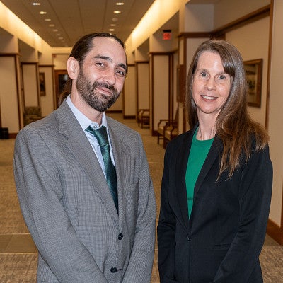 Oregon Law student Clark Barlowe poses with his coach for The Closer competition, Oregon Law Professor Kristie Gibson.