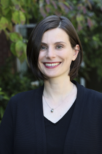 image of Jennifer Reynolds, a smiling woman with short brown hair and blue eyes