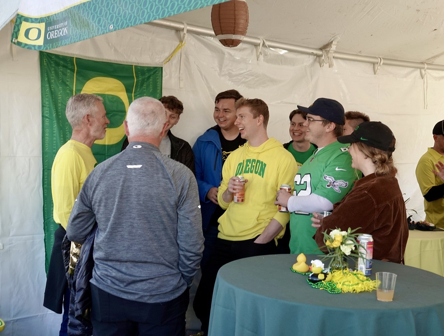 DAC member talks with students at tailgate