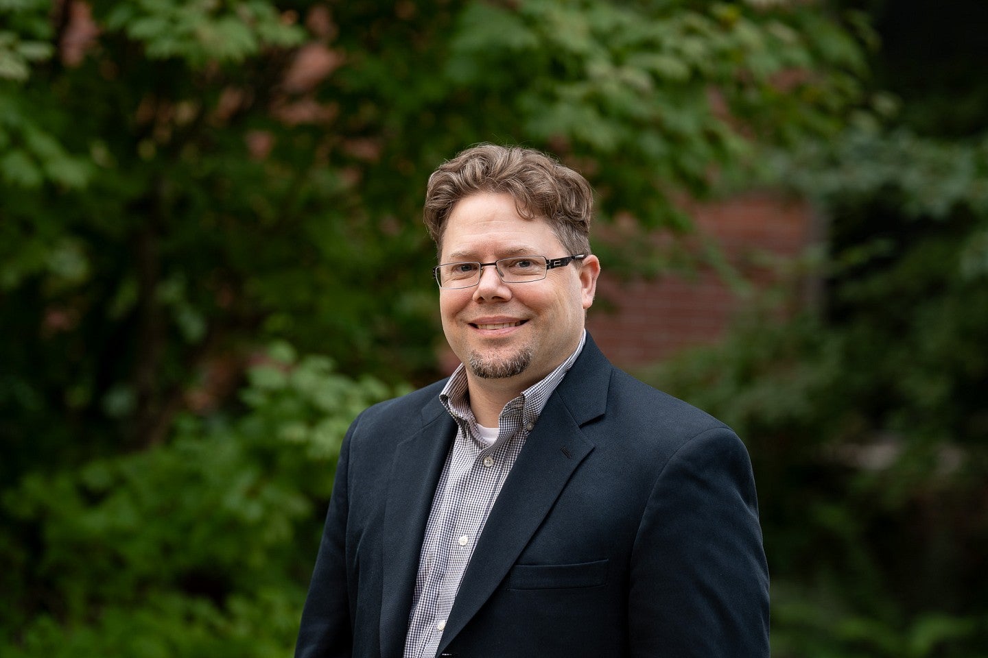 Headshot of Professor Erik Girvan