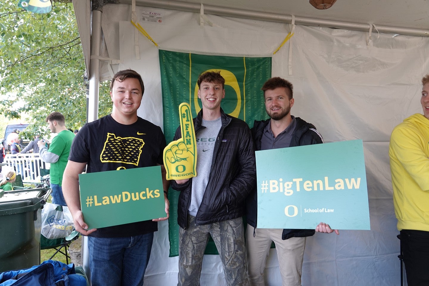 Students holding oregon law signs