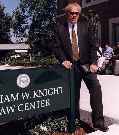 Knight by Law Center Sign