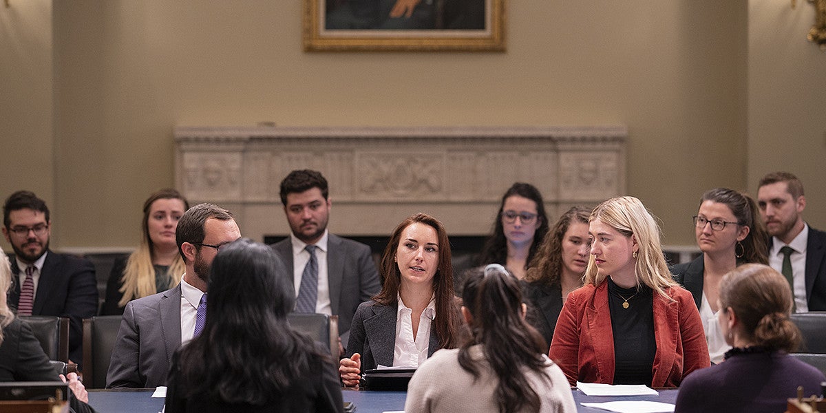 Law students present their policy research on integrating labor standards into climate change policy to the Select Committee on the Climate Crisis 