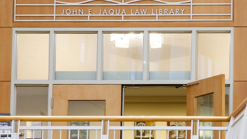 tight shot of front entrance with library name