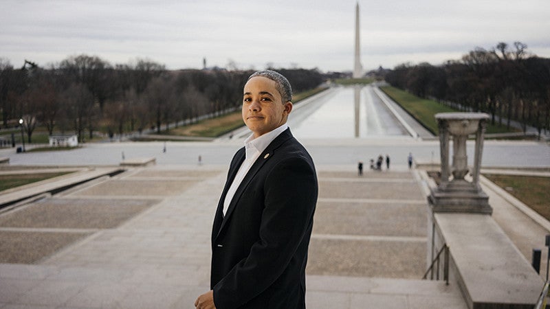 Alumna Rose Gibson standing in DC with Washington monument in background