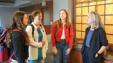 Students talk to Professor of Law Erin Carroll.