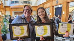 Professor Adell Amos and ENR Program Assistant Madi Prue pose with their awards