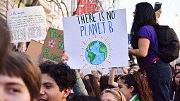 student protesters with "there is no planet b" signs