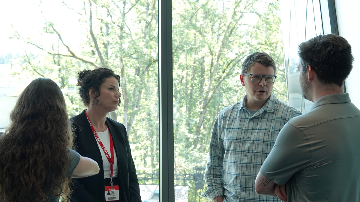 Students network with Nike attorneys after the Q&A