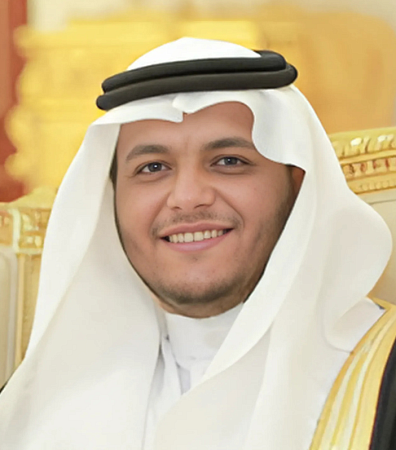 young Arab man wearing an agal and smiling