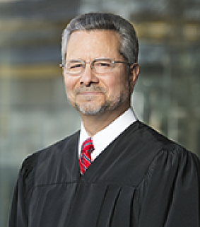 The Honorable John Acosta