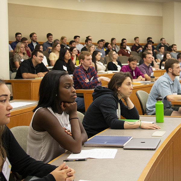  photo of students in class looking forward