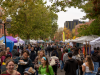 Students walking around a University of Oregon street faire.