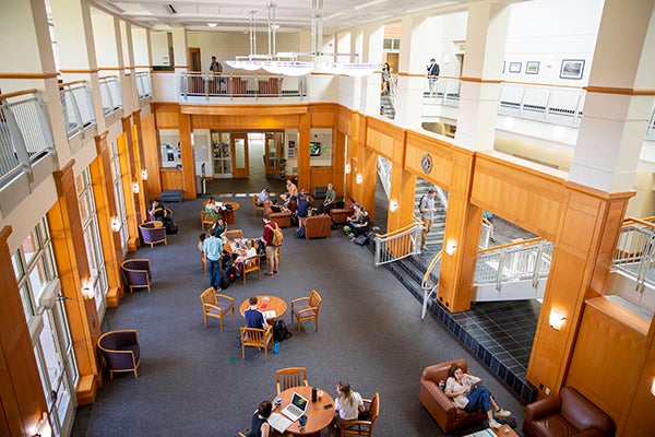 students in a busy commons area