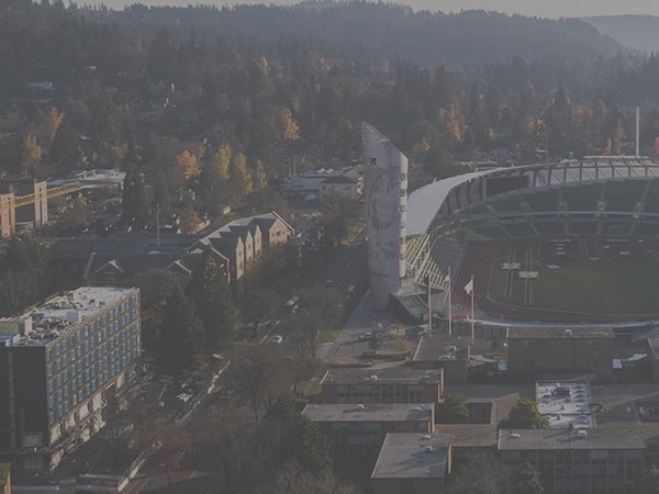 aerial view of the campus with Hayward Field centered- split left