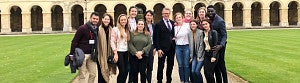 Raymund Fellows at Oxford University. Former conflict and dispute resolution faculty member Cheyney Ryan (center) helped develop the program with support from the Clark Honors College and the law school. A group of Raymund Fellows at Oxford University