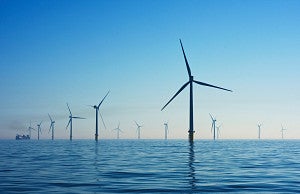 white electric windmill in water