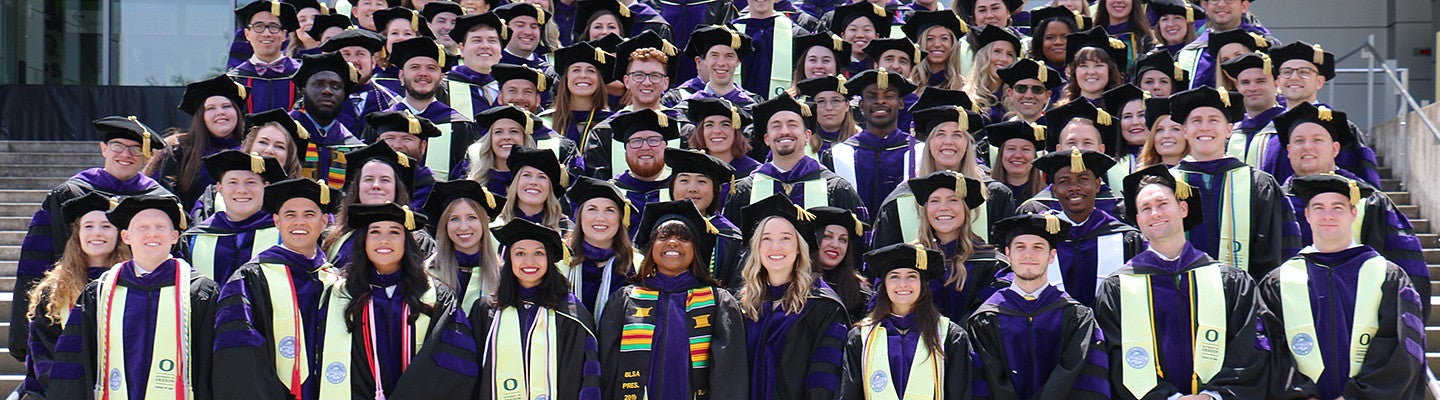 2019 graduating class in their graduation gowns