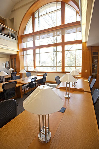 3rd floor law library large window with sunlight on study desks