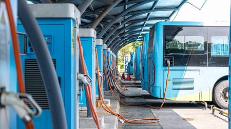 As chief counsel for the Senate Environment and Public Works Committee, Greg Dotson helped shepherd a major infrastructure bill through Congress. The bill includes funding for electric vehicles and public transit. (Image: THINK b/Adobe Stock)