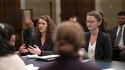 Catherine Pratt JD '20 and Renee Seacor JD '20 present their research on the challenge and opportunity of increasing tree cover in urban areas