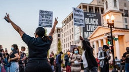 A crowd in Washington, D.C. reacts to the guilty verdict for former police officer Derek Chavin for the murder of George Floyd. (Shutterstock)