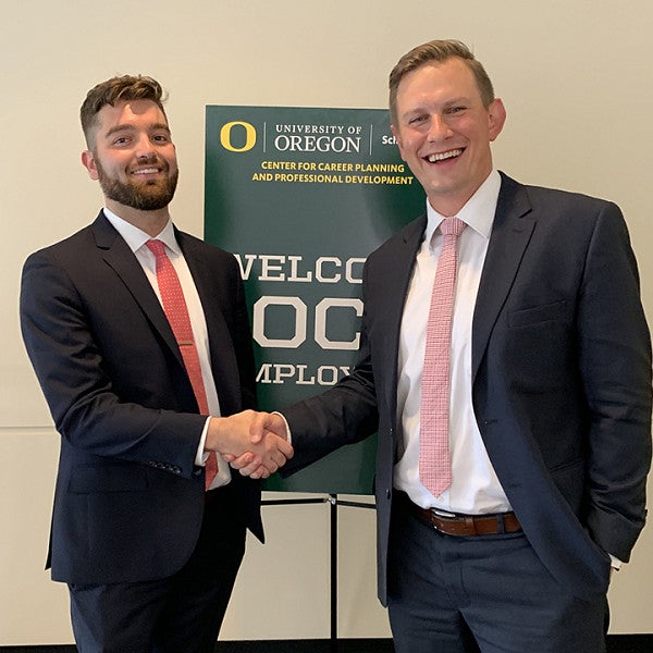 A JD student and an Alumnus employer meet at the On-Campus Interviews.