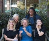 LRW professors laughing during a group photo shoot